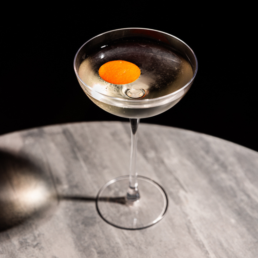 The Black Seas cocktail, made with rajika and garnished with orange