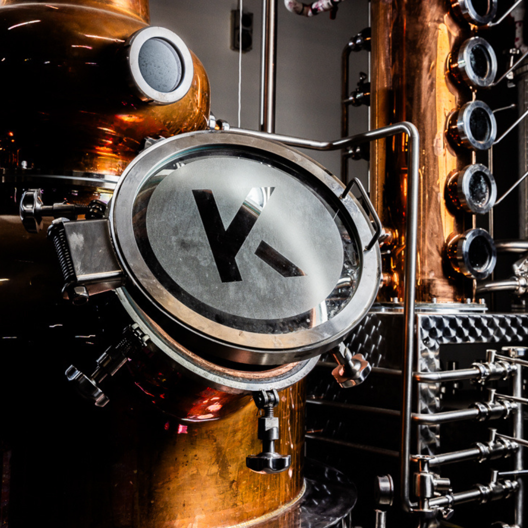 A copper kettle embossed with the letter K for Kabina Distilling, in which rakija is distilled in Melbourne, Australia